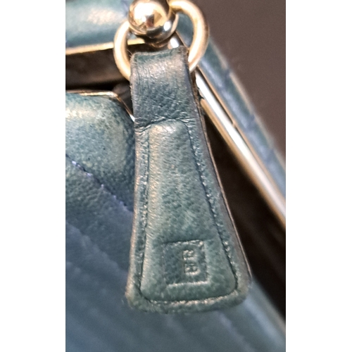 378 - BALLY GEOMETRIC TOTE BAG
early-to-mid 1990s, in turquoise quilted leather, silver-tone hardware, wit... 