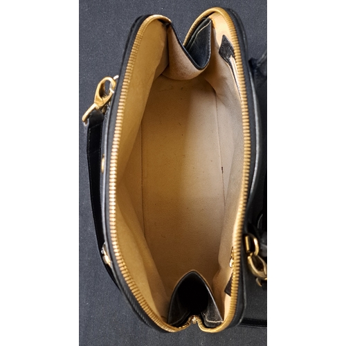 385 - AIGNER MUNICH BOWLER BAG
late 1980s, in black leather, gold-tone hardware, with dual top handles, a ... 