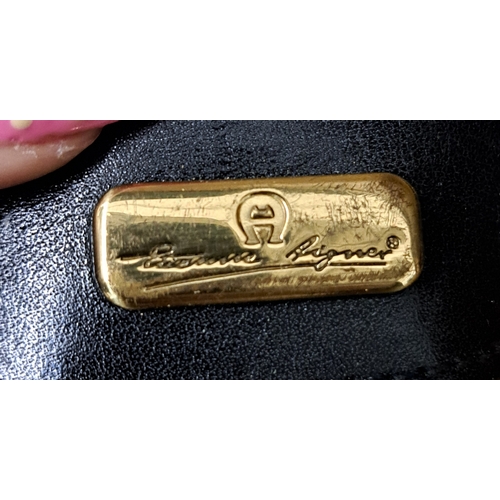 385 - AIGNER MUNICH BOWLER BAG
late 1980s, in black leather, gold-tone hardware, with dual top handles, a ... 
