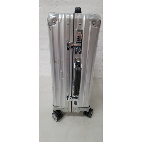 26 - RIMOWA CLASSIC CABIN SUITCASE
of anodised aluminium alloy with riveted corners and fittings