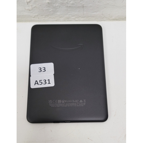 33 - AMAZON KINDLE PAPERWHITE 6 SIGNATURE EDITION/ MODEL: SA569P- BLACK