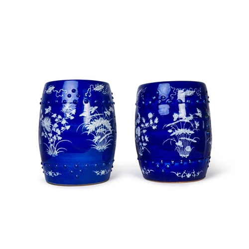 111 - A PAIR OF CHINESE COBALT-BLUE AND WHITE GARDEN SEATS 19TH/ 20TH CENTURY

 Each with moulded bands of... 