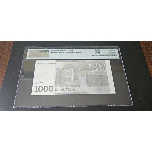 911 - Kyrgyzstan, Kyrgyz Bank
Pick# 29a 2010 1000 Som - Printer: TDLR
S/N BE1599406/1499406 - Wmk: Z. Bala... 