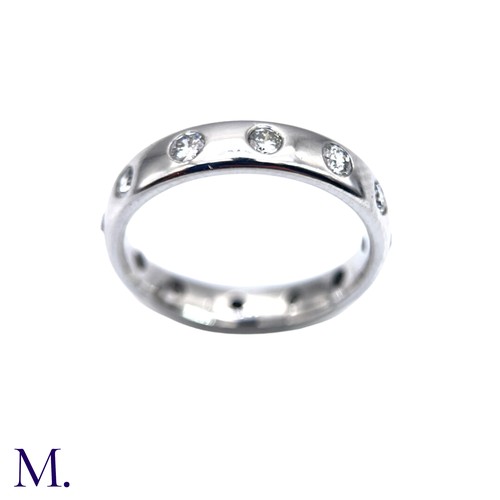 6 - A Diamond Band Ring

The band is flush set in 18ct white gold with twelve bright diamonds set around... 