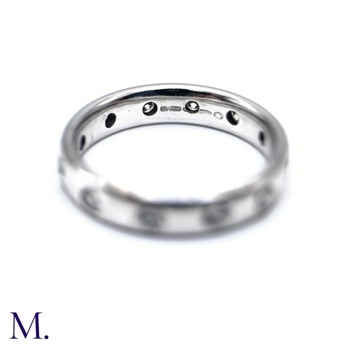 6 - A Diamond Band Ring

The band is flush set in 18ct white gold with twelve bright diamonds set around... 