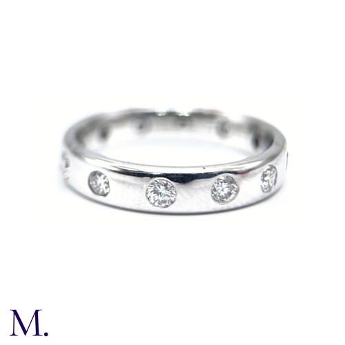 6 - A Diamond Band Ring

The band is flush set in 18ct white gold with twelve bright diamonds set around... 