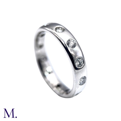 6 - A Diamond Band Ring

The band is flush set in 18ct white gold with twelve bright diamonds set around... 