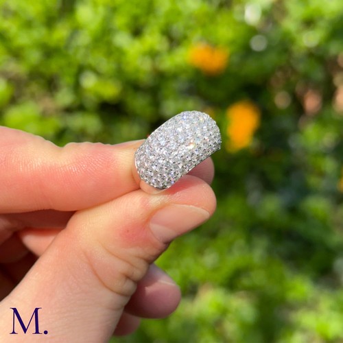 7 - Fine Pavé Diamond Bombe Ring

The platinum ring is set with approximately 3.0ct of bright white bril... 