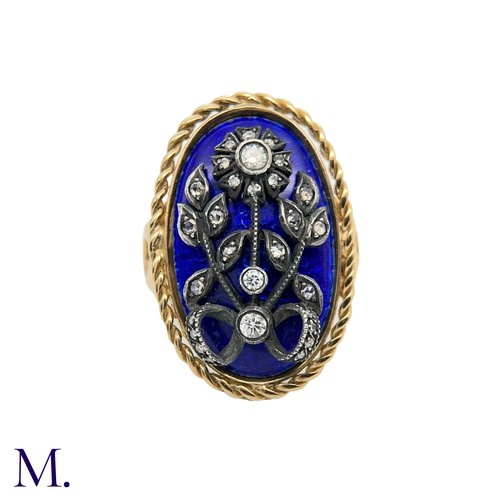 9 - Antique Blue Enamel and Diamond Ring

The antique gold ring is set with a blue enamel plaque with si... 