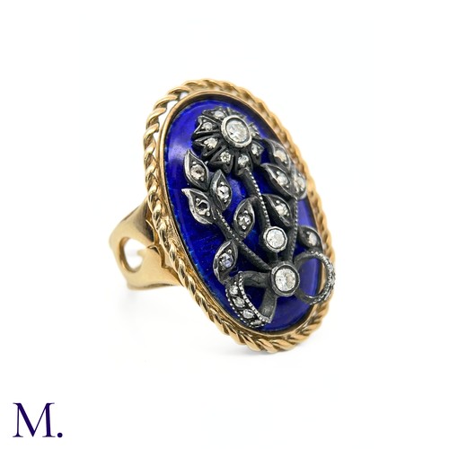 9 - Antique Blue Enamel and Diamond Ring

The antique gold ring is set with a blue enamel plaque with si... 