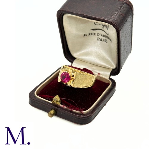 10 - An 18ct Gold and Ruby Ring

The heavy 18ct Gold ring is set with a round cut ruby (possibly syntheti... 