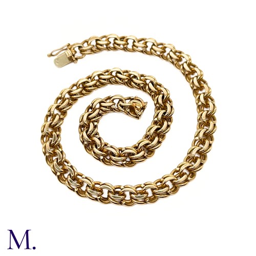 17 - An 18ct Gold Collar by Van Cleef and Arpels

The heavy gold collar by Van Cleef and Arpels is made u... 