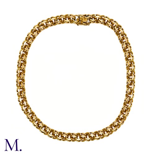 17 - An 18ct Gold Collar by Van Cleef and Arpels

The heavy gold collar by Van Cleef and Arpels is made u... 