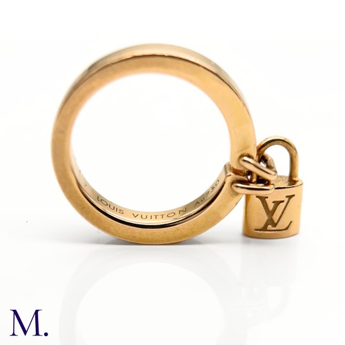 21 - A Padlock Ring by Louis Vuitton

The 18ct gold ring by Louis Vuitton is held together with the iconi... 