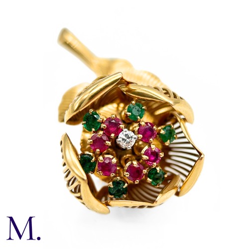 22 - A Fine Ruby, Diamond and Emerald Articulated Flower Brooch.

The 18ct yellow gold flower brooch is s... 