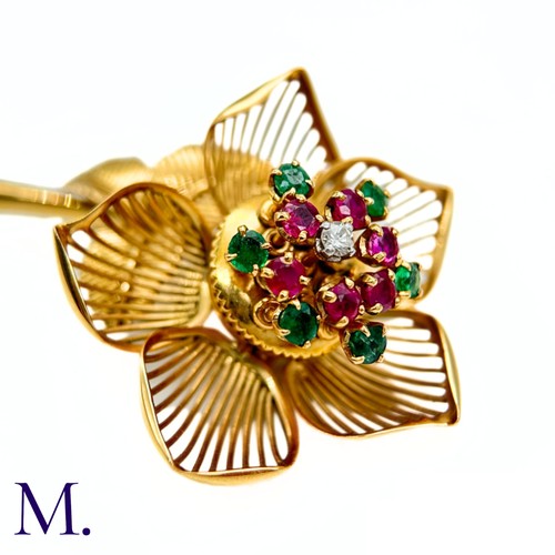 22 - A Fine Ruby, Diamond and Emerald Articulated Flower Brooch.

The 18ct yellow gold flower brooch is s... 