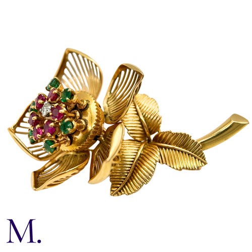 22 - A Fine Ruby, Diamond and Emerald Articulated Flower Brooch.

The 18ct yellow gold flower brooch is s... 