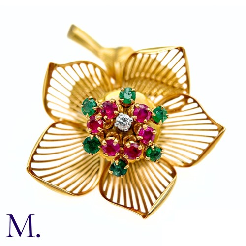 22 - A Fine Ruby, Diamond and Emerald Articulated Flower Brooch.

The 18ct yellow gold flower brooch is s... 