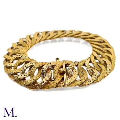 24 - A 18ct Gold Bracelet by Georges Lenfant

The gold woven bracelet by Georges Lenfant is of high quali... 