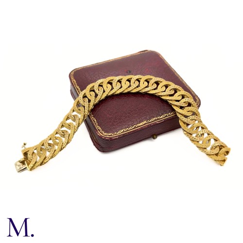 24 - A 18ct Gold Bracelet by Georges Lenfant

The gold woven bracelet by Georges Lenfant is of high quali... 