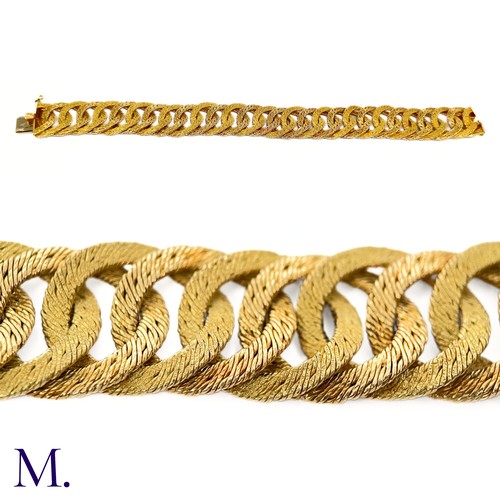 24 - A 18ct Gold Bracelet by Georges Lenfant

The gold woven bracelet by Georges Lenfant is of high quali... 