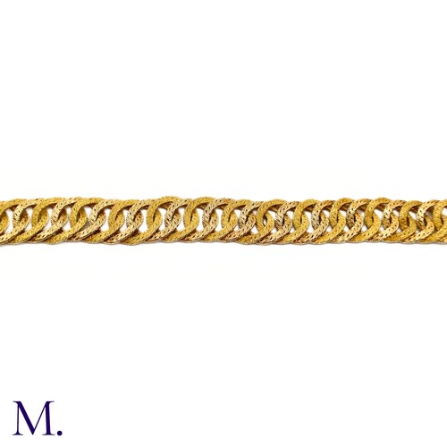 24 - A 18ct Gold Bracelet by Georges Lenfant

The gold woven bracelet by Georges Lenfant is of high quali... 