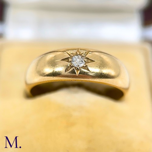 25 - An Antique Diamond Gypsy Ring

The gold band is set with a 5pt diamond and is marked '18ct'.

Box no... 