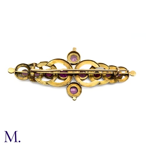 28 - An Antique French Garnet Brooch

The 18ct yellow gold brooch (approx. 55x25mm) takes the form of ove... 