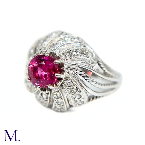 31 - A French Ruby and Diamond Tourbillon Ring

The platinum ring is set with a deep red, round cut ruby ... 