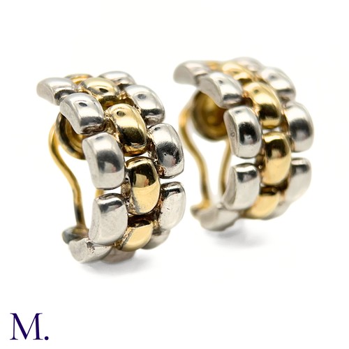 32 - A Pair of Gold and Silver Earclips by Chopard
The earclips are marked for 18ct and silver in respect... 