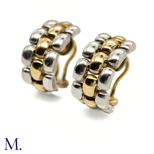 32 - A Pair of Gold and Silver Earclips by Chopard
The earclips are marked for 18ct and silver in respect... 