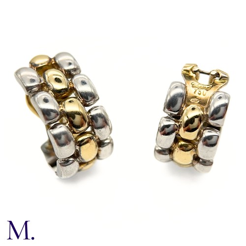 32 - A Pair of Gold and Silver Earclips by Chopard
The earclips are marked for 18ct and silver in respect... 