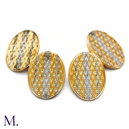 35 - A Pair of 18ct Gold and Platinum Cufflinks

The 18ct yellow gold and platinum cufflinks are oval sha... 