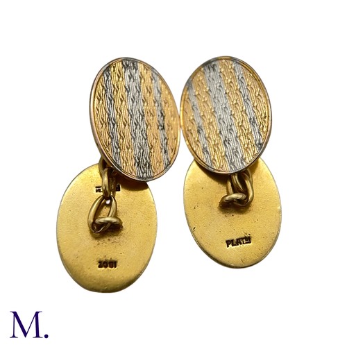 35 - A Pair of 18ct Gold and Platinum Cufflinks

The 18ct yellow gold and platinum cufflinks are oval sha... 