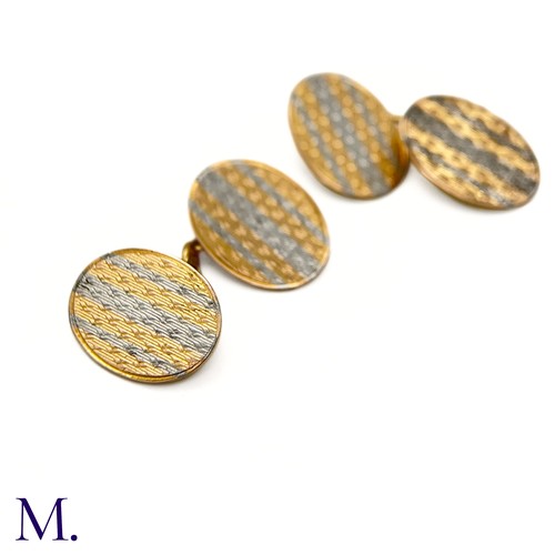 35 - A Pair of 18ct Gold and Platinum Cufflinks

The 18ct yellow gold and platinum cufflinks are oval sha... 