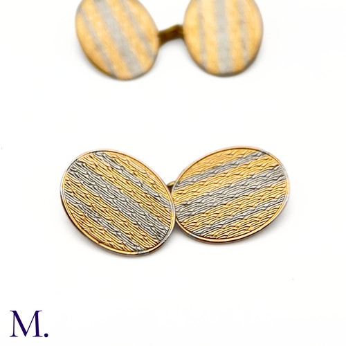 35 - A Pair of 18ct Gold and Platinum Cufflinks

The 18ct yellow gold and platinum cufflinks are oval sha... 