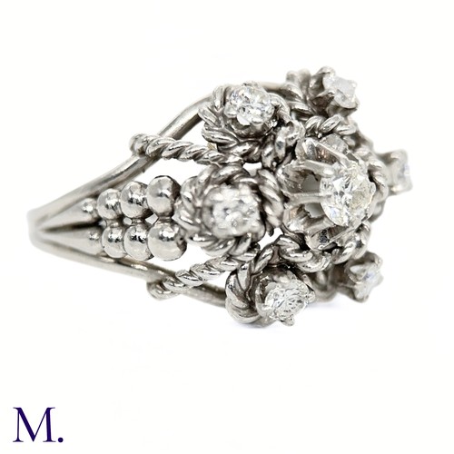 38 - A Diamond Cluster Ring 

The diamond cluster is centre diamond is set with a centre stone of approxi... 