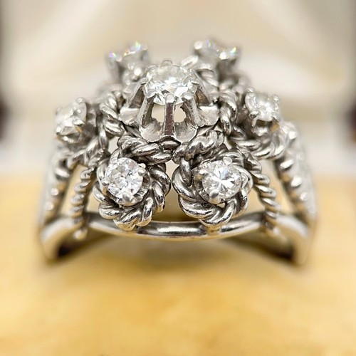 38 - A Diamond Cluster Ring 

The diamond cluster is centre diamond is set with a centre stone of approxi... 