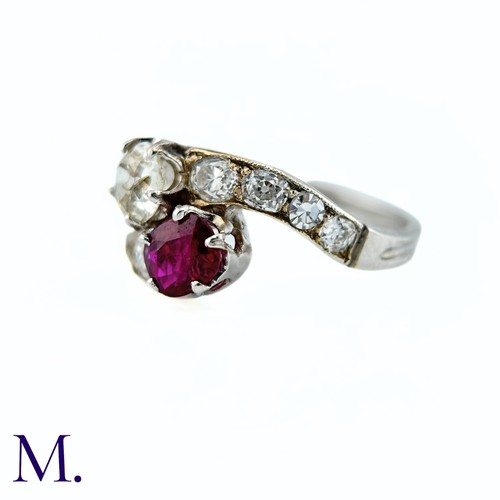 40 - An Antique Ruby and Diamond Toi et Moi Ring

The antique 18ct white gold ring of French origin is se... 