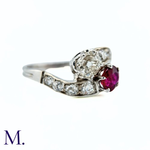 40 - An Antique Ruby and Diamond Toi et Moi Ring

The antique 18ct white gold ring of French origin is se... 