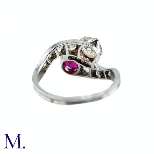 40 - An Antique Ruby and Diamond Toi et Moi Ring

The antique 18ct white gold ring of French origin is se... 