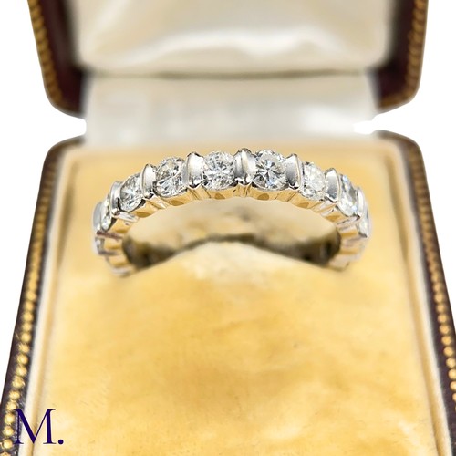 41 - A Diamond Band Ring

The 18ct white gold band is set with round cut diamonds amounting to approximat... 