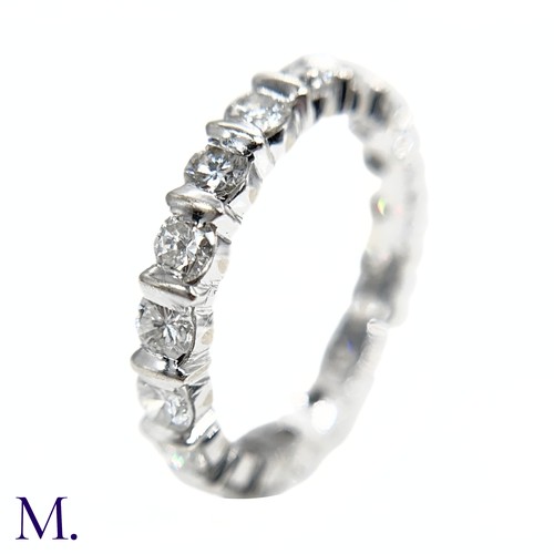 41 - A Diamond Band Ring

The 18ct white gold band is set with round cut diamonds amounting to approximat... 