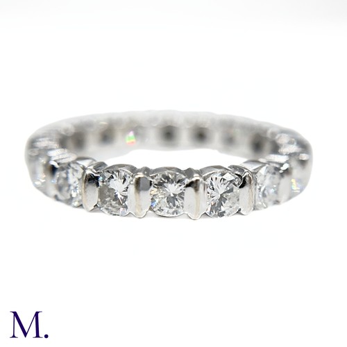 41 - A Diamond Band Ring

The 18ct white gold band is set with round cut diamonds amounting to approximat... 