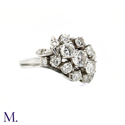 46 - A Diamond Cluster Ring 

The 18ct white gold ring is set with three principal diamonds weighing appr... 