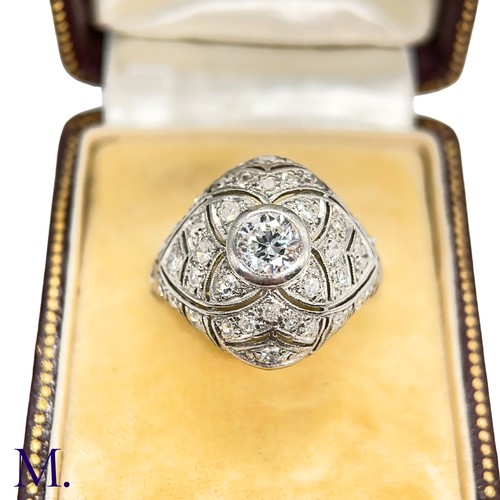 48 - An Art Deco Diamond Bombe Ring

The 18ct white gold Art Deco bombe ring is set with a round cut diam... 