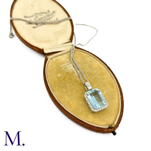 50 - An Aquamarine and Diamond Pendant and Chain.

The fine aquamarine of approximately 9.5ct is surround... 