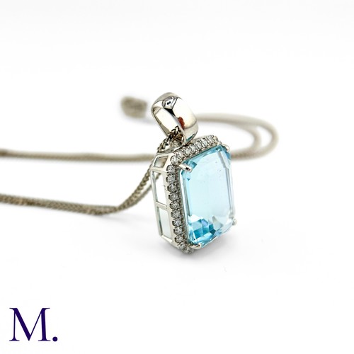 50 - An Aquamarine and Diamond Pendant and Chain.

The fine aquamarine of approximately 9.5ct is surround... 