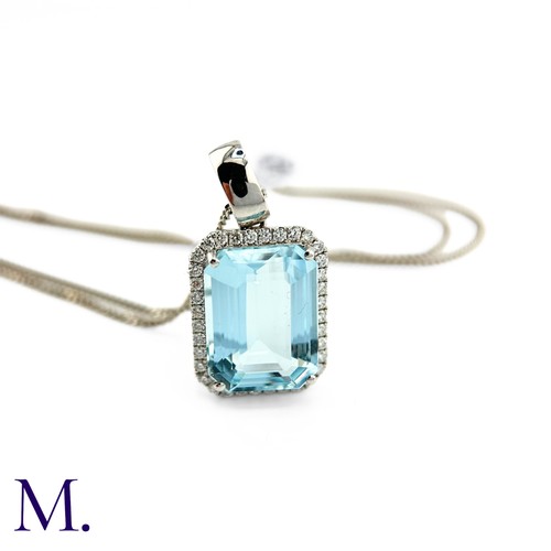 50 - An Aquamarine and Diamond Pendant and Chain.

The fine aquamarine of approximately 9.5ct is surround... 