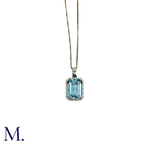 50 - An Aquamarine and Diamond Pendant and Chain.

The fine aquamarine of approximately 9.5ct is surround... 